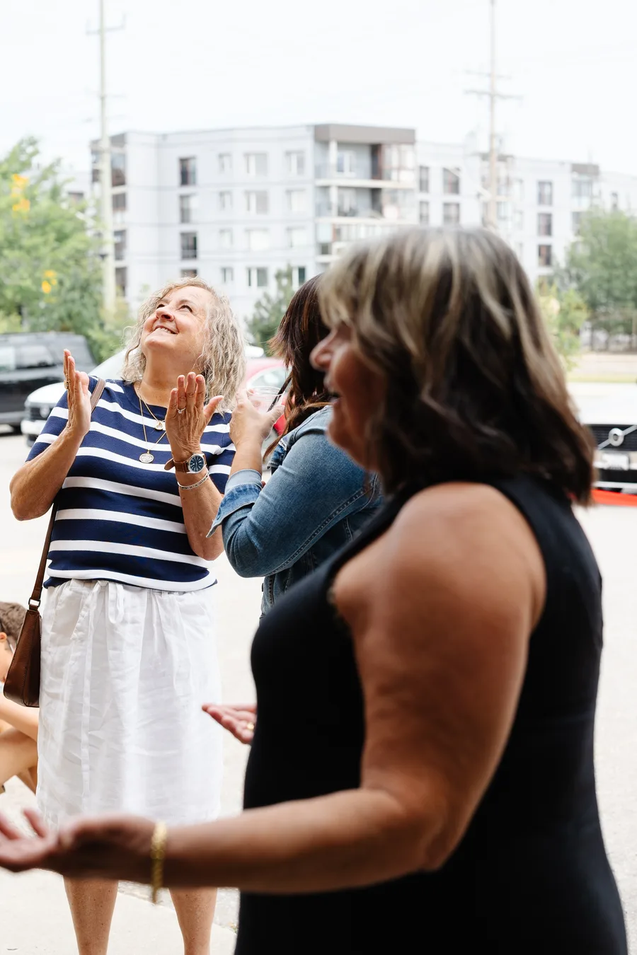 Happy patients outside simplyHEAR
